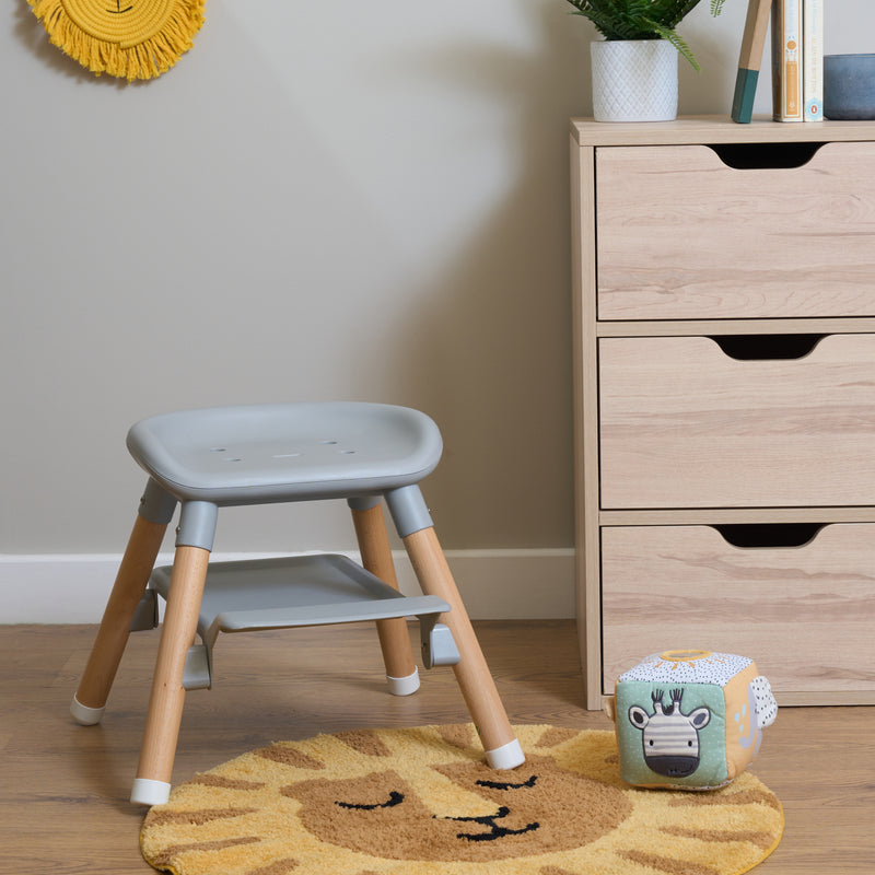 Grey 6in1 High Chair converted to a kids stool in the nursery surrounded by toddler toys | Highchairs | Feeding & Weaning - Clair de Lune UK