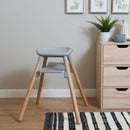 Grey 6in1 High Chair converted to a junior stool in the kitchen next to a chest of drawers | High chairs | Feeding & Weaning | Toddler Furniture - Clair de Lune UK