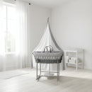 Waffle Grey Wicker Moses Basket Starter Set & Deluxe Drape a white nursery by a bright window | Drape Sets | Moses Baskets and Stands | Co-sleepers | Nursery Furniture - Clair de Lune UK