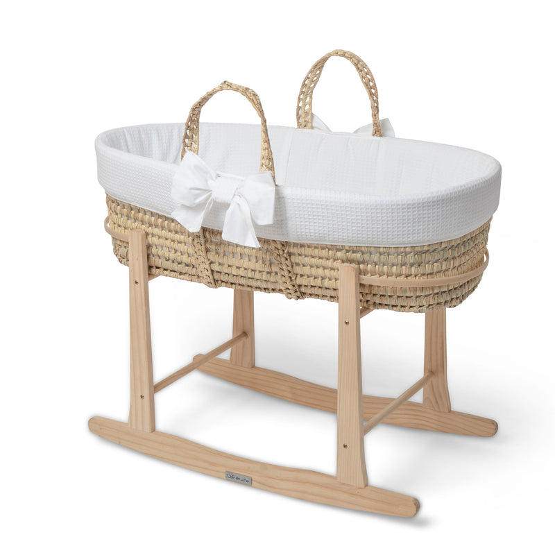 White 80th Anniversary Chelsea Palm Moses Basket on the Natural Standard Rocking Stand | Moses Baskets and Stands | Co-sleepers | Nursery Furniture - Clair de Lune UK