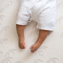 Baby sleeping on the Natural Bamboo Folding Crib Mattress (76 x 36 cm) | Bedside & Folding Crib Mattresses | Baby & Toddler Mattresses | Bedding | Nursery Furniture - Clair de Lune UK