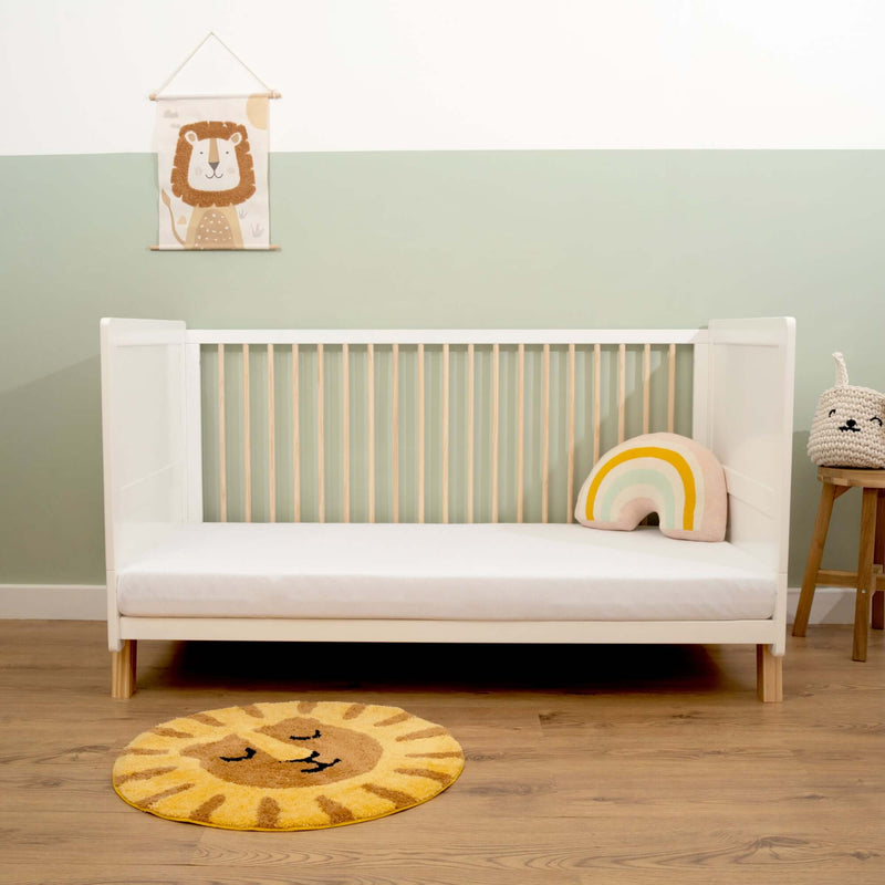 White Essentials Cot Bed as a toddler bed in a sage green Scandi nursery room | Cots, Cot Beds, Toddler & Kid Beds | Nursery Furniture - Clair de Lune UK