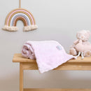 Rolled Pink Marshmallow Baby Blanket on an oak shelf in the nursery | Cosy Baby Blankets | Nursery Bedding | Newborn, Baby and Toddler Essentials | Baby Christmas Gift Idea 2024 - Clair de Lune UK