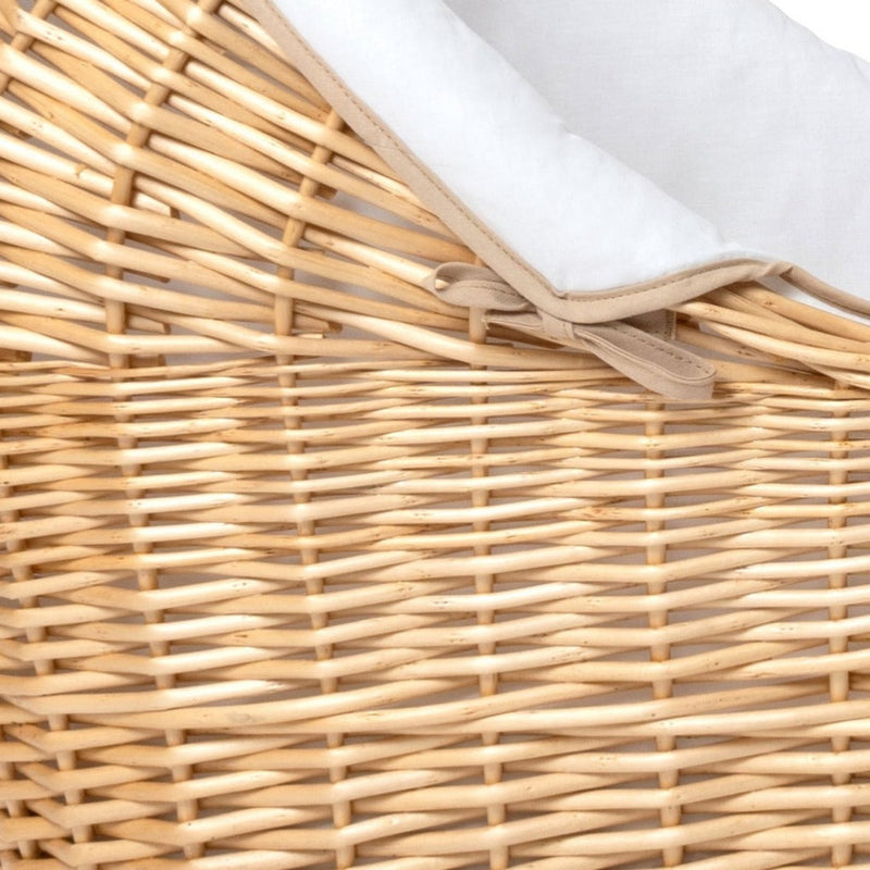 White Organic Natural Noah Pod with the white organic dressing and sturdy natural wicker basket zoomed in with the bow detail | Bassinets | Nursery Furniture - Clair de Lune UK
