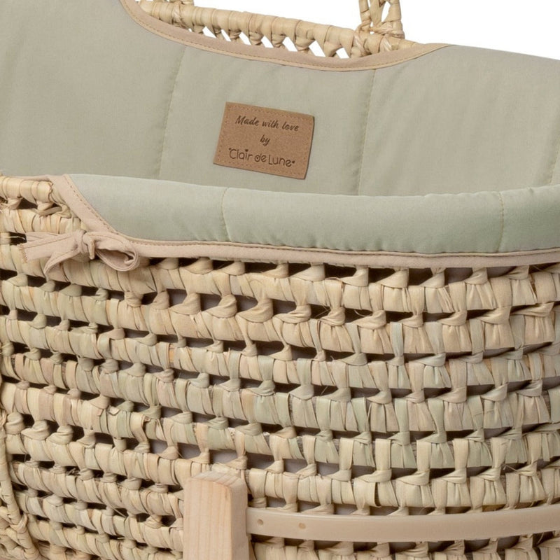 The vegan leather label of the Sage Green Organic Palm Moses Basket | Moses Baskets and Stands | Co-sleepers | Nursery Furniture - Clair de Lune UK