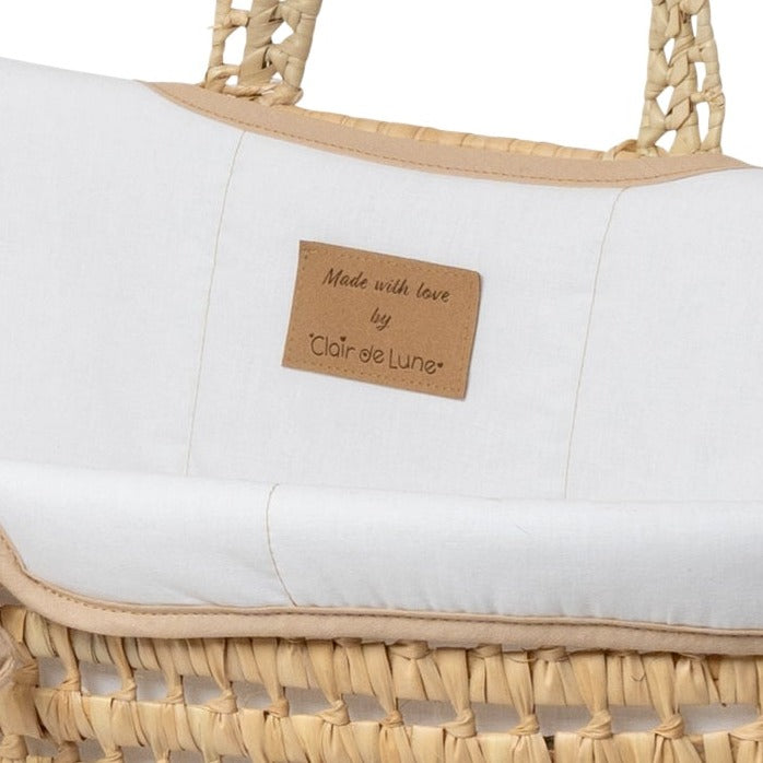 The signature vegan leather Clair de Lune label of the White Organic Palm Moses Basket | Moses Baskets | Co-sleepers | Nursery Furniture - Clair de Lune UK