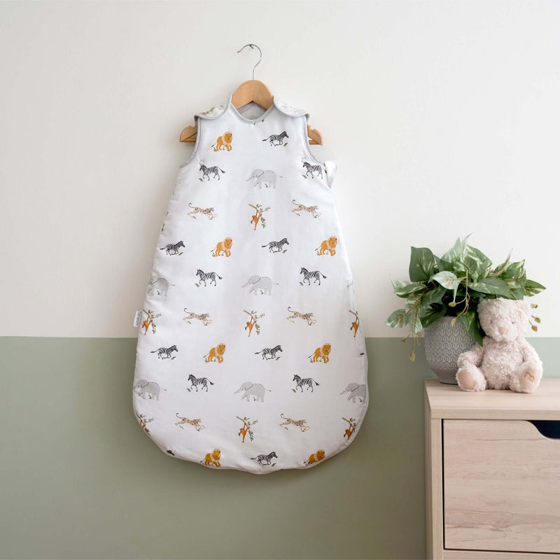 Jungle Dream Sleeping Bag (0-6 Months) hung on the wall in a Scandi Pastel Green room | Baby Sleep Bags, Shawls, Swaddles & Sleepbags | Nightwear | Nursery - Clair de Lune UK