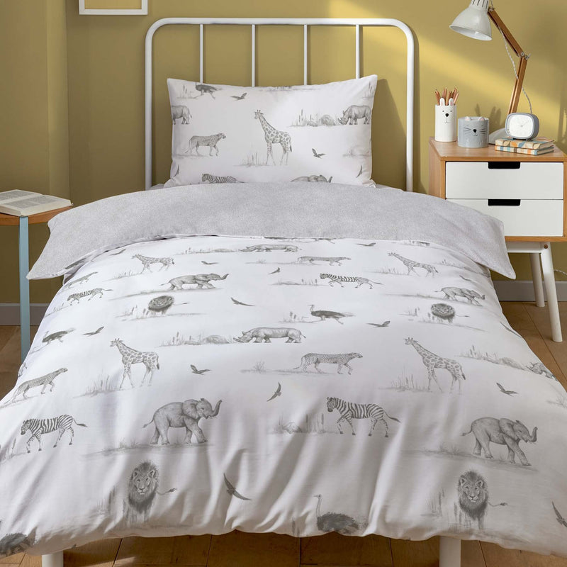 Zambezi Safari Animal white & grey single bedding displayed in a neutral childs bedroom | Single Bedding | Kids Bedding - Clair de Lune UK