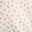 Close up of the Blush Pink Dash Paint Brush Print on the Anti-Roll Wedge Baby Changing Mat | Baby Bath Time Essentials - Clair de Lune UK