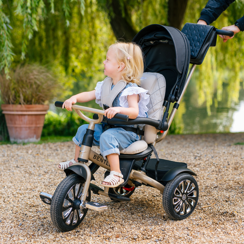 Little girl enjoying wheeling her Mulliner Bentley 6in1 Trike - Convertible Baby Stroller | Strollers, Pushchairs & Prams | Pushchairs, Carrycots & Car Seats Baby | Travel Essentials - Clair de Lune UK