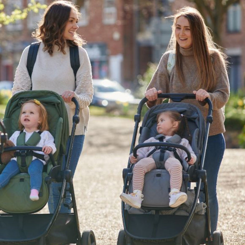 Moms pushing their kids to school with the Didofy Stargazer 11 Piece Ultimate Travel System Bundle in Green and Grey | Didofy | Pushchairs and Travel Systems | Baby & Kid Travel - Clair de Lune UK