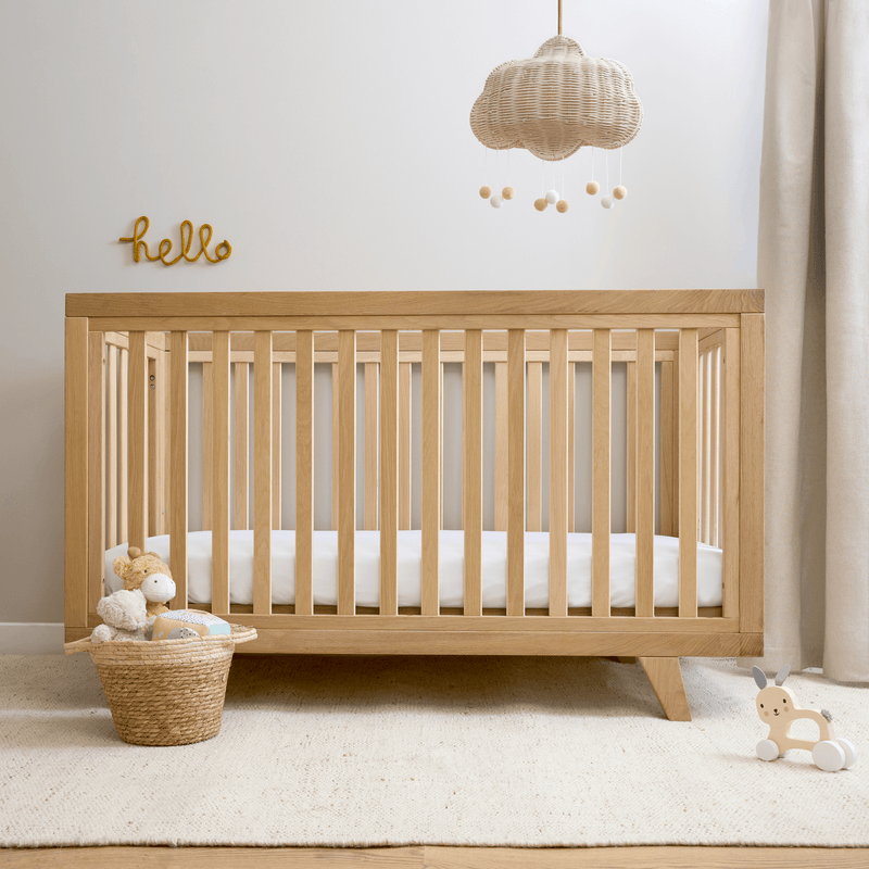Oak Cot Bed in a Scandi Natural Nursery Room | Cots, Cot Beds, Toddler & Kid Beds | Nursery Furniture - Clair de Lune UK