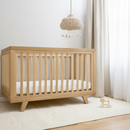 Solid Oak Cot Bed in neutral nursery by the window | Nursery Furniture - Clair de Lune UK