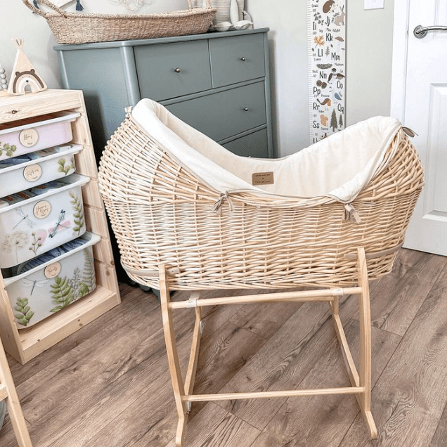 Cream Organic Natural Noah Pod on the Natural Deluxe Rocking Stand in a Safari nursery | Bassinets | Nursery Furniture - Clair de Lune UK