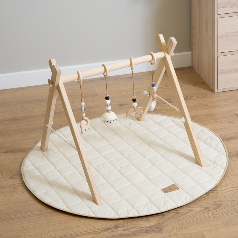 Natural Wooden Play Gym Baby Set up on the Cream Organic Play Mat | Baby Play Mats & Gyms | Baby Tummy Time Toys - Clair de Lune UK