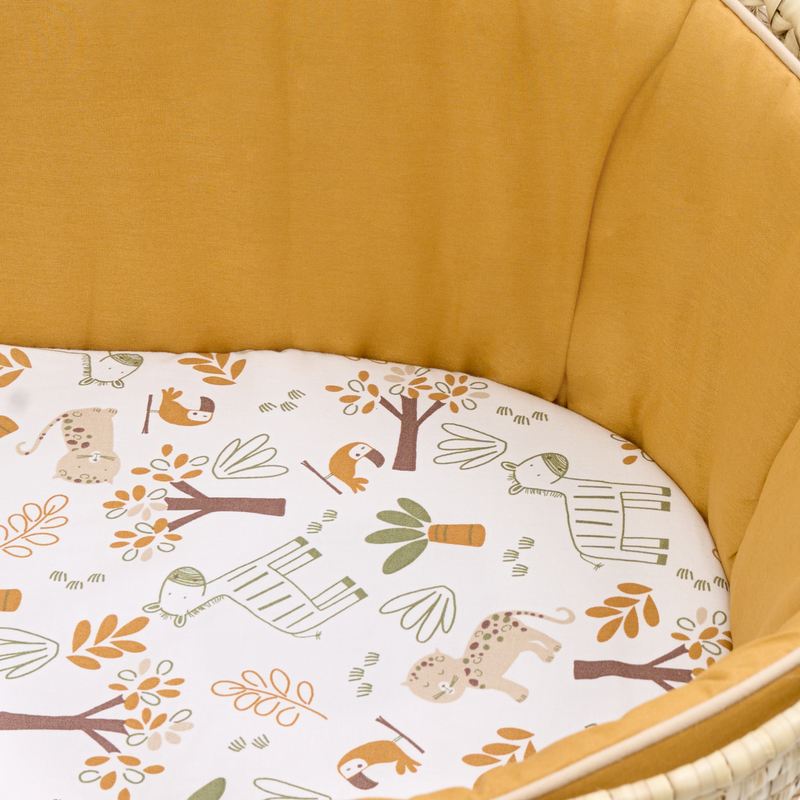 Gold Savannah Palm Moses Basket with the yellow fabrics and savannah print sheet zoomed in | Moses Baskets | Co-sleepers | Nursery Furniture - Clair de Lune UK
