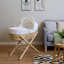 White Dimple Palm Moses Basket on natural folding stand in Greige living room with oak floor | Moses Baby Baskets, Bassinets & Co-sleepers | Nursery Furniture - Clair de Lune UK