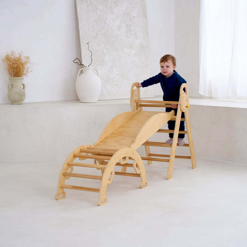 Boy playing climbing the ladders on the 3 in 1 wooden activity climbing set in a minimalistic room | Toys | Indoor Play Equipment  | Climbing Frames - Clair de Lune UK
