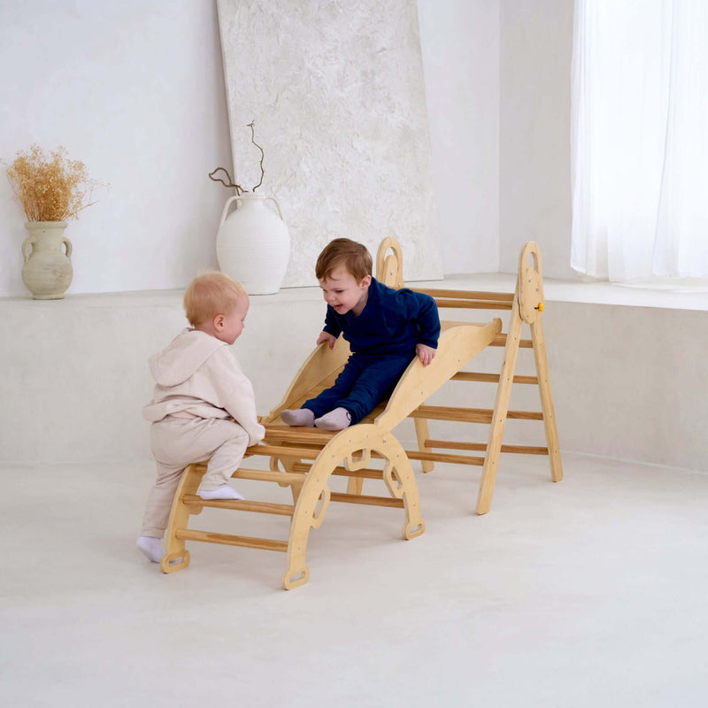 Children laughing and playing on the montessori 3 in 1 wooden activity climbing set in a minimalistic room | Toys | Indoor Play Equipment  | Climbing Frames - Clair de Lune UK