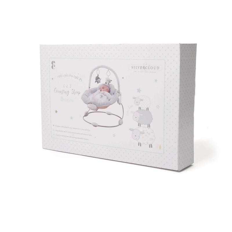 White East Coast Counting Sheep Baby Bouncer in the packaging showing the USPs | Baby Bouncers, Rockers & Baby Swings | Newborn Baby Toys | Nursery Furniture - Clair de Lune UK