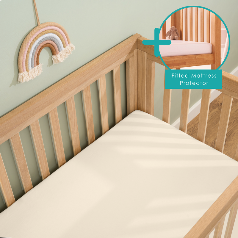 Cream 2 Pack Cot Bed Sheet & Mattress Protector Bundle on the Solid Oak Cot Bed | Soft Baby Sheets | Cot & Cot Bed Bedding | Nursery Linen - Clair de Lune UK