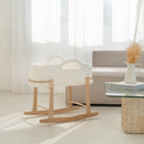 White Crochet Moses Basket With Stand in a neutral and calm beige living room | Moses Baby Baskets & Bassinets - Clair de Lune UK