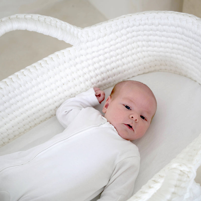 Newborn baby in the White Crochet Moses Basket | Charity Partnerships - Clair de Lune UK