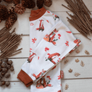 Grow Grows Organic Fluffy Foxes Pyjamas Folded on a wooden floor | Organic Kids PJs and Nightwear - Clair de Lune UK