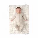 Baby lying on Dash Foldable Travel Changing Mat laid out flat | Baby Change Mat | Bathing & Changing Essentials - Clair de Lune UK