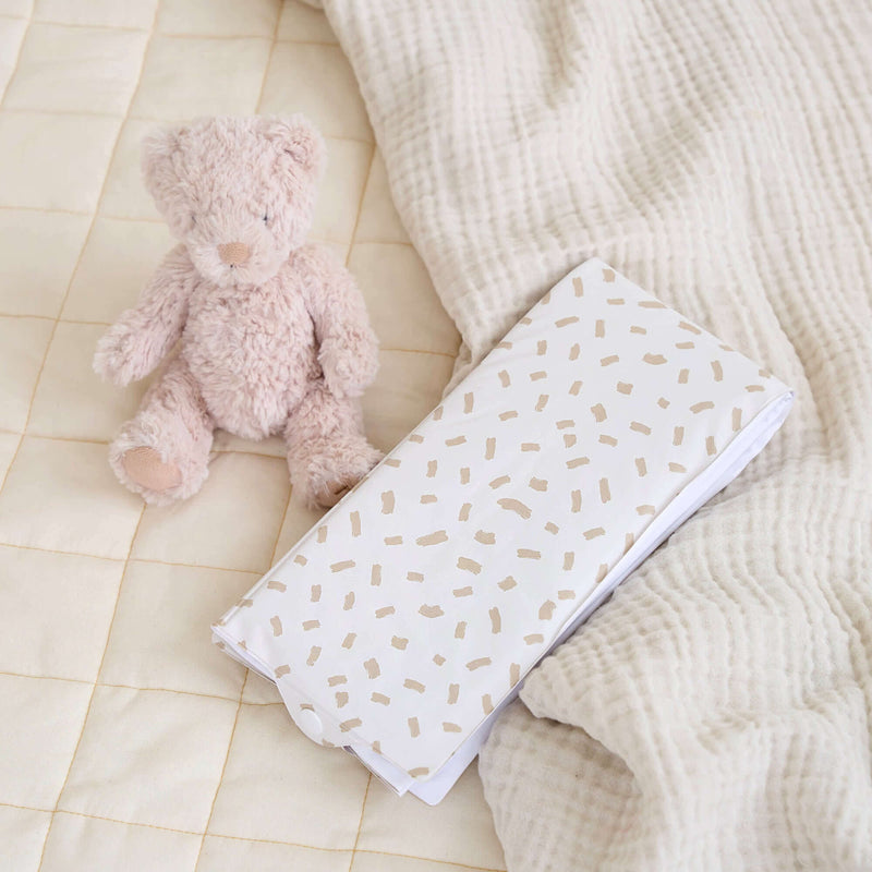 Dash Foldable Travel Changing Mat packed up on the cream organic play mat | Baby Change Mats | Bathing & Changing Essentials - Clair de Lune UK