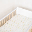 2 Pack Fitted Little Duckling Cot Bed Sheets on white Essentials Cot Bed against a white wall | Baby Sheets | Cot & Cot Bed Bedding | Nursery Linen - Clair de Lune UK