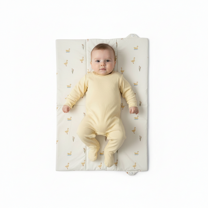 Duckling Foldable Travel Changing Mat laid out flat | Baby Change Mat | Bathing & Changing Essentials - Clair de Lune UK