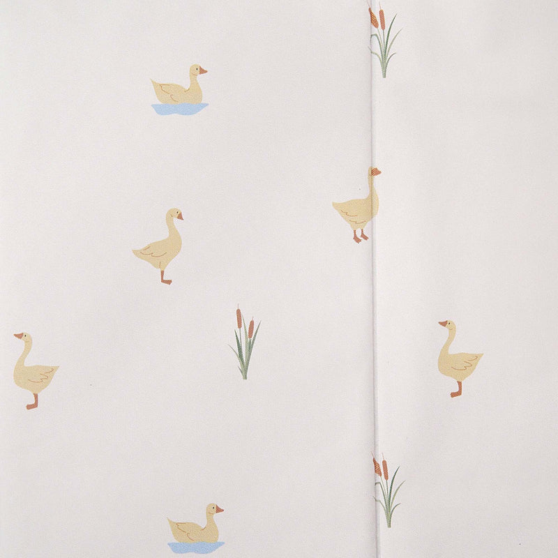 Close up of the duck and reed print on the Duckling Foldable Travel Changing Mat | Bathing & Changing Essentials - Clair de Lune UK