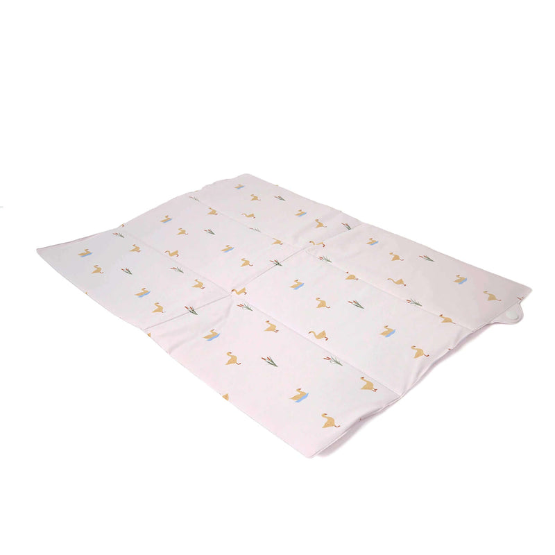 Duckling Foldable Travel Changing Mat laid out flat on an angle on a white background | Bathing & Changing Essentials - Clair de Lune UK