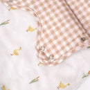 Little Duckling Sleeping Bag (0-6 Months) close-up of the neutral gingham interior | Swaddles and Sleep Bags | Baby Bedding | Nursery Accessories - Clair de Lune UK
