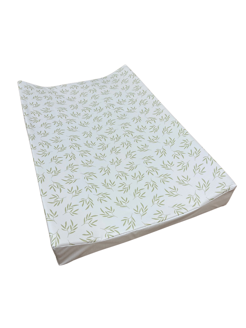 Leaf Anti-Roll Wedge Baby Changing Mat Angled View to Show the Safe Extra Padding | Baby Bath Time Essentials - Clair de Lune UK