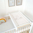 East Coast Little and Loved Changing Mat on the Essentials Cot Bed Cot top Changer in a white nursery with cute pictures on the wall | Bathing & Changing Essentials - Clair de Lune UK