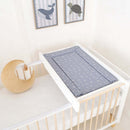 Blue East Coast Seashell Changing Mat on the Essentials Cot Top Changer in a white nursery with whale and turtle pictures on the wall | Bathing & Changing Essentials - Clair de Lune UK