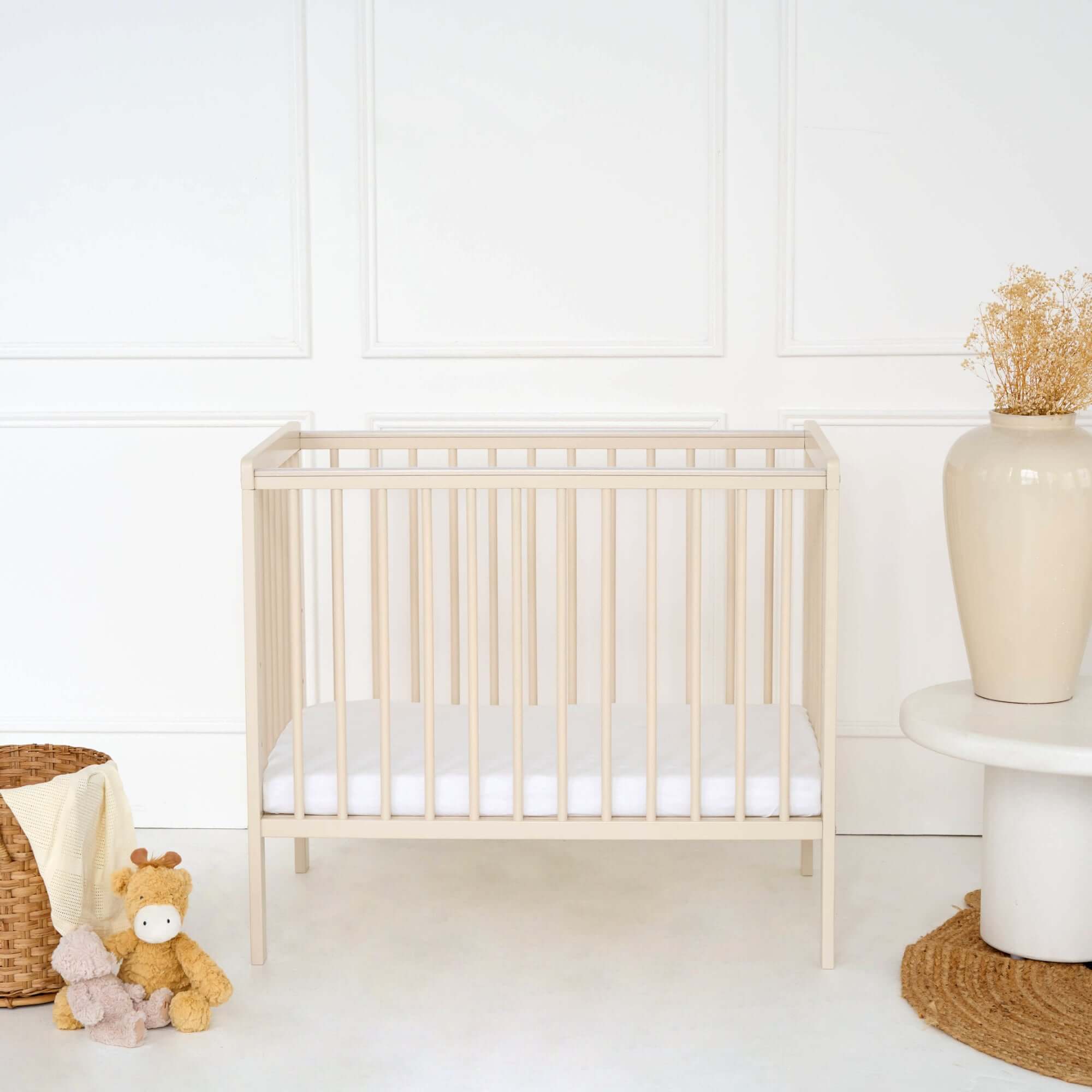 Cashmere East Coast Space Saver Cot with Mattress Bundle in a beige nursery | Cots, Cot Beds & Toddler Beds | Nursery Furniture - Clair de Lune UK