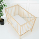 Natural East Coast Space Saver Cot with mini mattress in a white nursery with East Coast 2 Pack Space Saver Cot Sheets | Cots, Cot Beds & Toddler Beds | Nursery Furniture - Clair de Lune UK