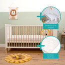 White Essentials Cot Bed bundled with the Essentials Cot Top Changer and Bamboo Cot Bed Mattress in a sage green Scandi nursery room | Cots, Cot Beds & Toddler Beds | Nursery Furniture - Clair de Lune UK