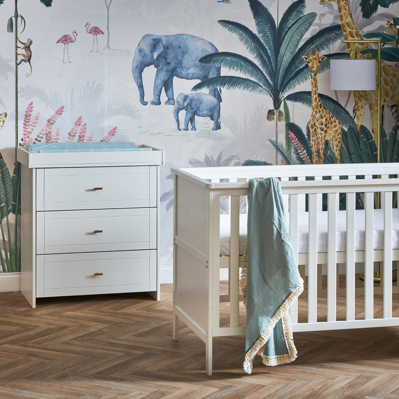 White Evie 2-Piece Room Sets including a cot bed and a changer from the Obaby Evie Room Sets in a jungle safari inspired nursery room | Nursery Furniture Sets | Room Sets | Nursery Furniture - Clair de Lune UK