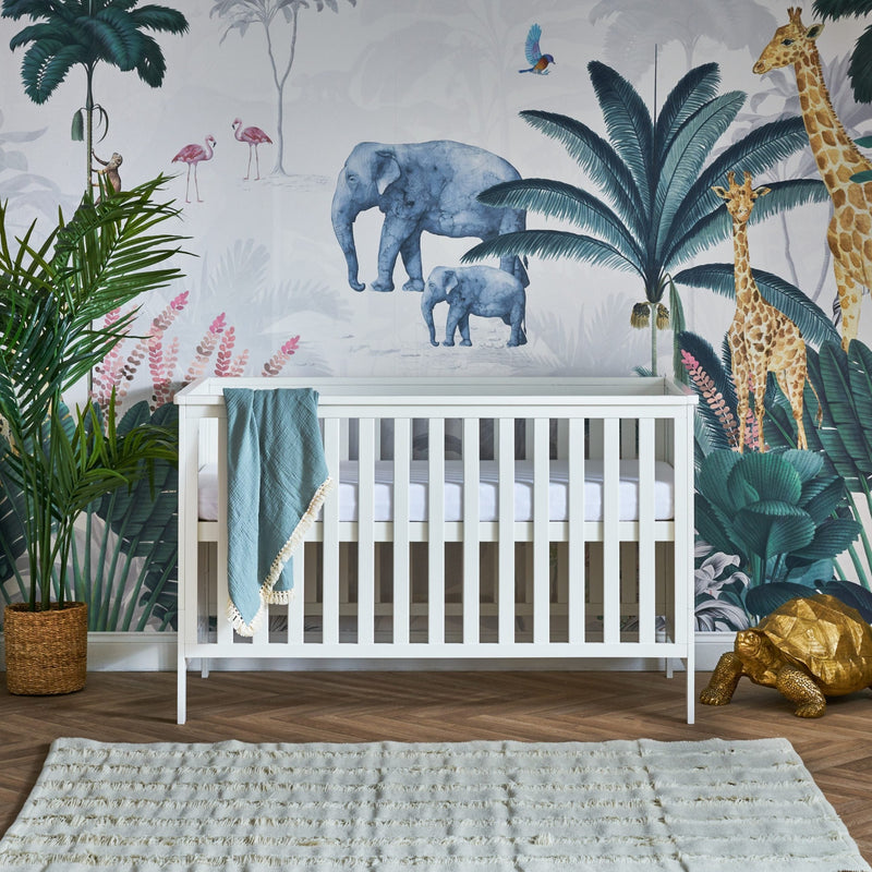 White Obaby Evie Cot Bed in a jungle safari inspired nursery room | Cots, Cot Beds, Toddler & Kid Beds | Nursery Furniture - Clair de Lune UK