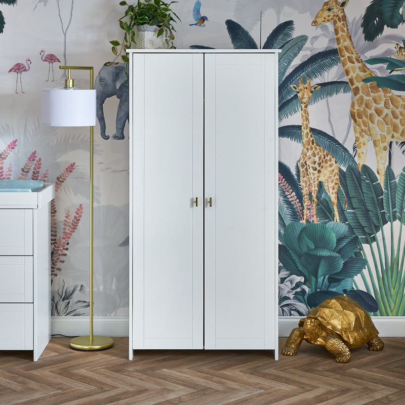 The double wardrobe of the White Obaby Evie Mini 3 Piece Room Set in a jungle-themed nursery room | Nursery Furniture Sets | Room Sets | Nursery Furniture - Clair de Lune UK