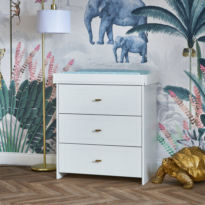 The changer of the White Obaby Evie Mini 3 Piece Room Set in a jungle-themed nursery room | Nursery Furniture Sets | Room Sets | Nursery Furniture - Clair de Lune UK