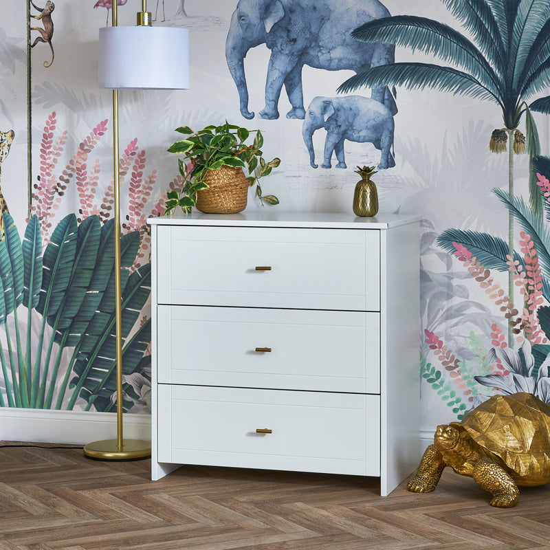The dresser of the White Obaby Evie Mini 2 Piece Room Set in a jungle-themed nursery room | Nursery Furniture Sets | Room Sets | Nursery Furniture - Clair de Lune UK