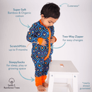 Toddler stood wearing the GrowGrows Organic Feather Flames Sleepsuit key features | Baby Grows and Onesies | Organic Baby Clothes - Clair de Lune UK