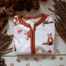Grow Grows Organic Fluffy Foxes Sleepsuit folded by autumn pinecones and twigs | Baby Grows and Onesies | Organic Baby Clothes - Clair de Lune UK