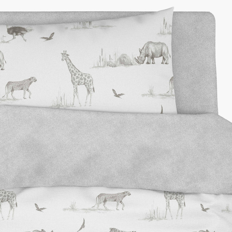 Little Knightley’s Samantha Fairs Safari Duvet Cover Set with the pillow cover's elephant fabrics zoomed in | Toddler Bedding - Clair de Lune UK