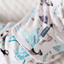 Close up on the Grow Grows Organic Arctic Animals Sleepsuit in a white room | Baby Grows and Onesies | Organic Baby Clothing - Clair de Lune UK